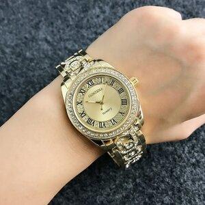 Жіночий золотистий годинник з кристалами код 605