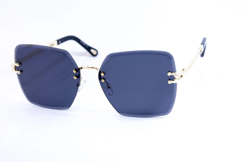 Сонцезахисні жіночі окуляри 0382-11 від компанії Shock km ua - фото 1