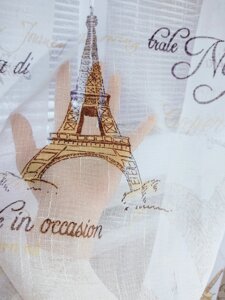 Тюль на білій основі з золотим малюнком "Париж"