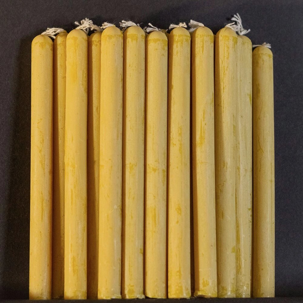 Жовті воскові свічки 12см (25шт) від компанії Іконна лавка - фото 1