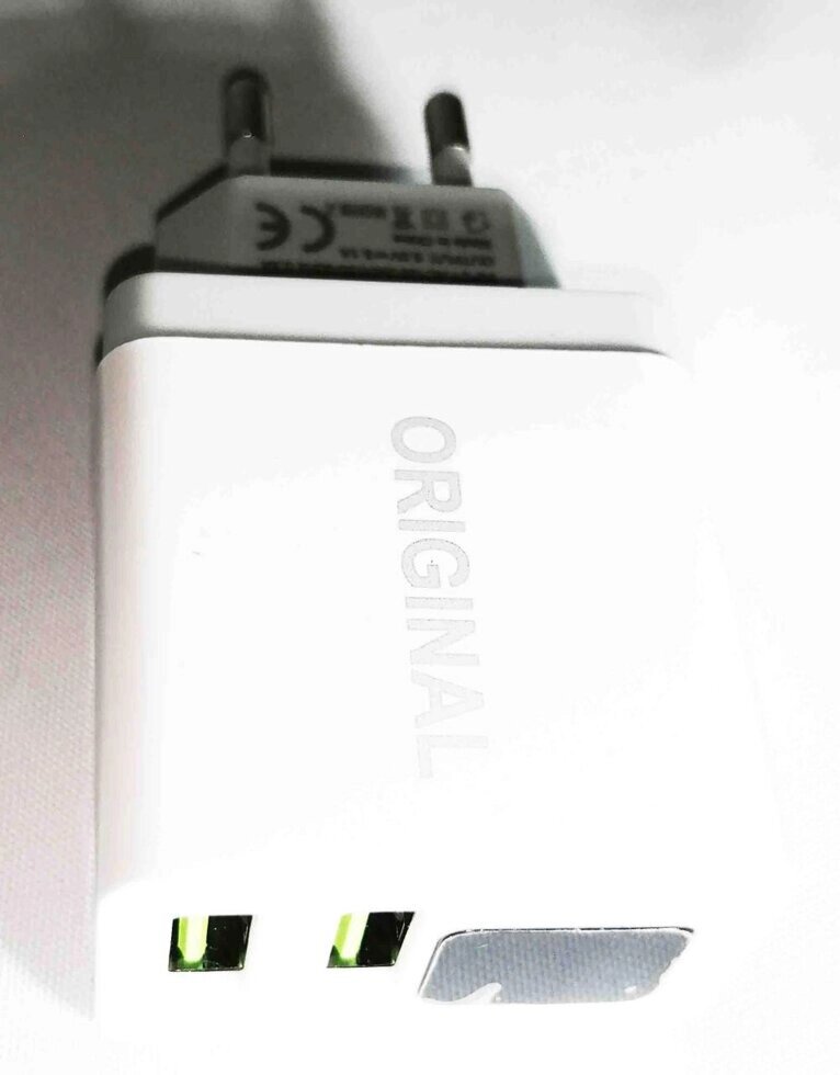 Зарядний пристрій UKC 220 В 2 USB CX QC03 від компанії Опт, роздріб інтернет магазин Familyshop - фото 1