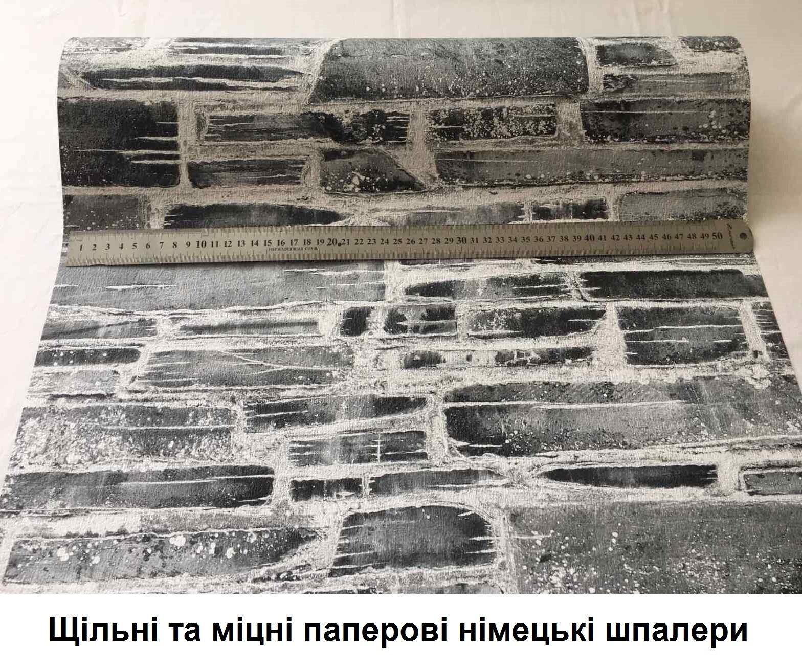 Екологічні паперові німецькі шпалери, стіна з кладкою плоского природного каменю, темних та світлих сірих графітових відтінків