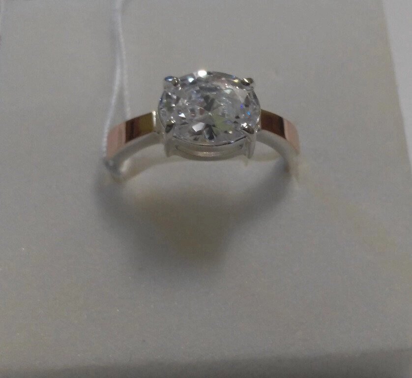 Срібний перстень з овальним цирконом і золотом Сяйво, 17 розмір від компанії Silver Sea - фото 1
