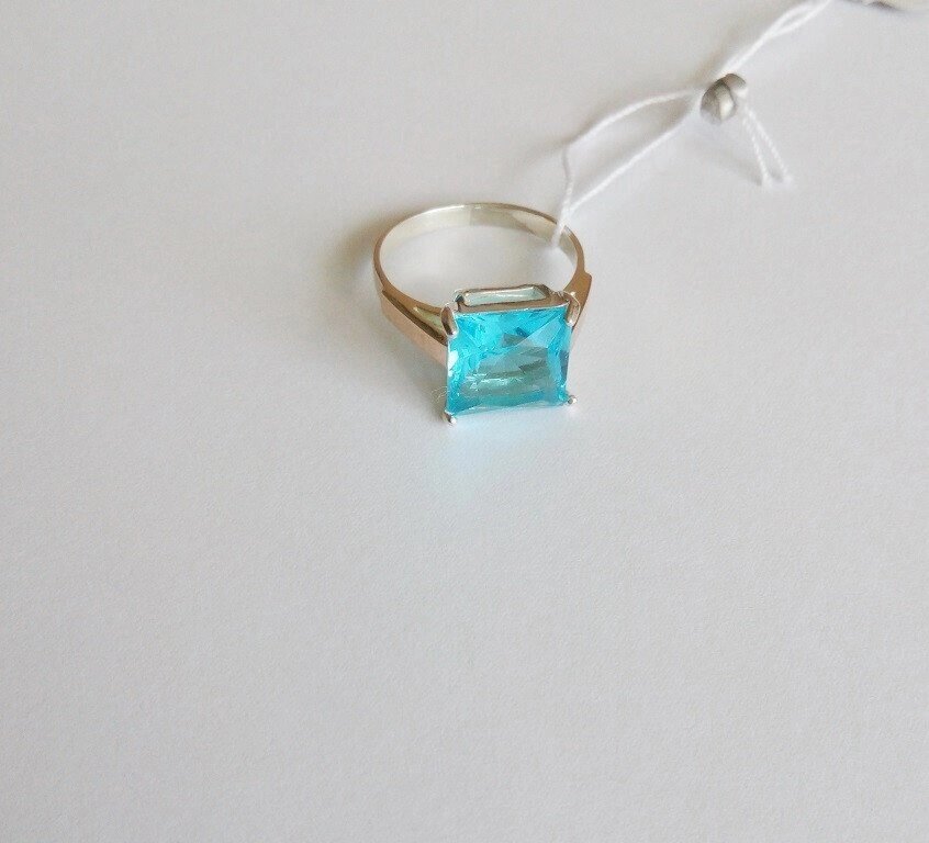Срібний перстень з золотом і блакитним каменем Бриз від компанії Silver Sea - фото 1