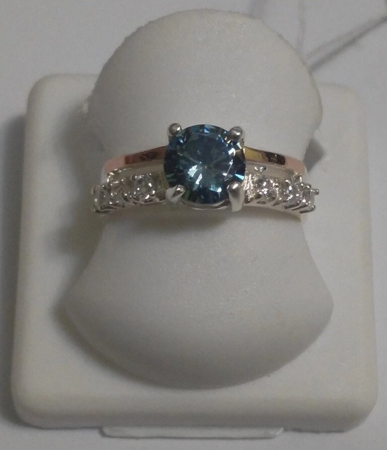Срібний перстень з золотом і блакитним кристалом Сіяна від компанії Silver Sea - фото 1
