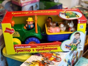 Іграшка на колесах — Трактор із трейлером і фермера українська