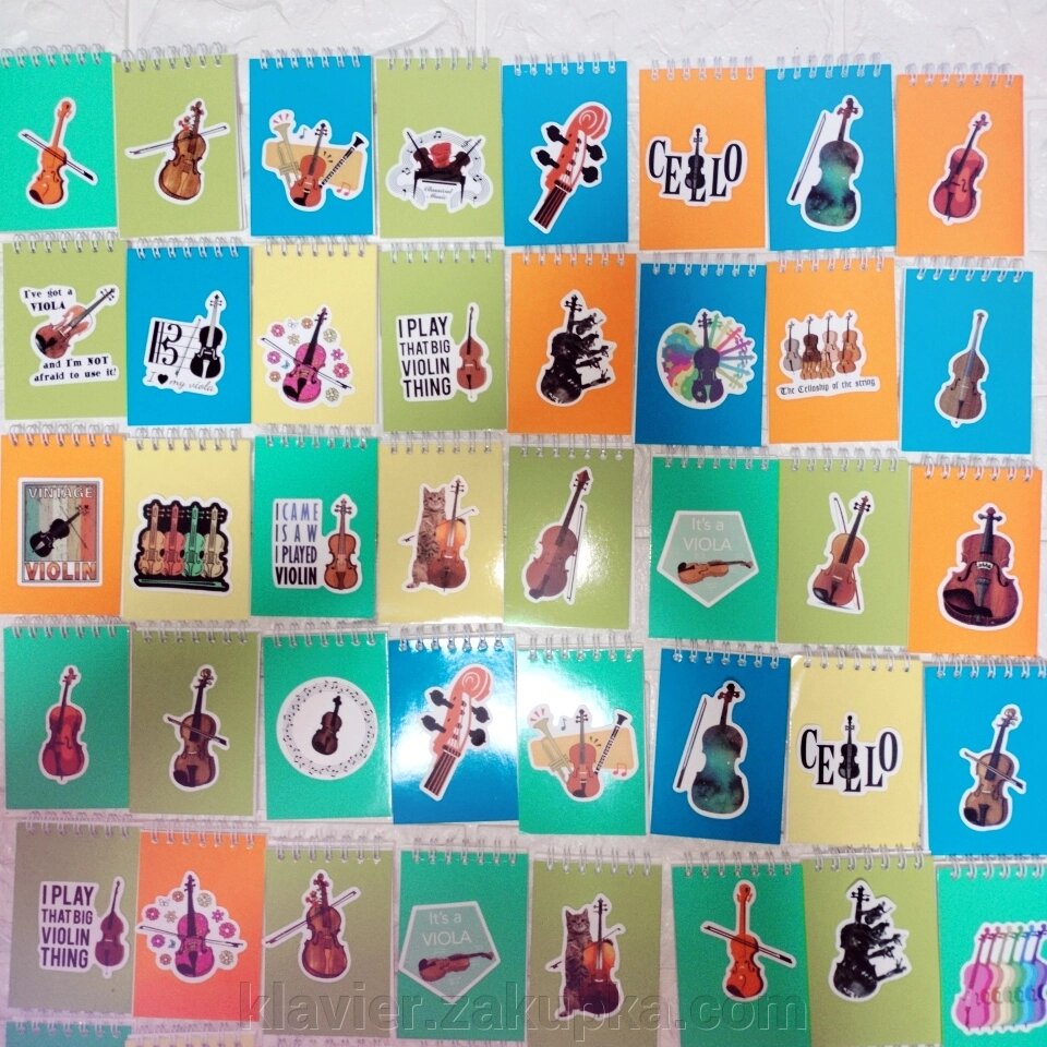 Блокнот на пружині А7-кольорові скрипки від компанії Нотний магазин "Клавир" - фото 1