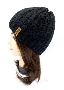 Жіноча шапка чорна в'язана на зиму вовняна, тепла зимова чорна шапка з флісом з вовни топ