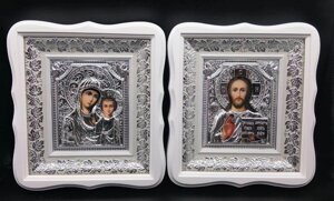 Ікони пари Спаситель+Казанська срібло 26,5х29 см., у білому дерев'яному фігурному кіоті