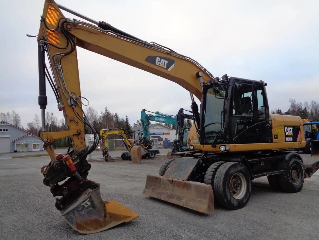 Колісний екскаватор Caterpillar M316 D. - замовити