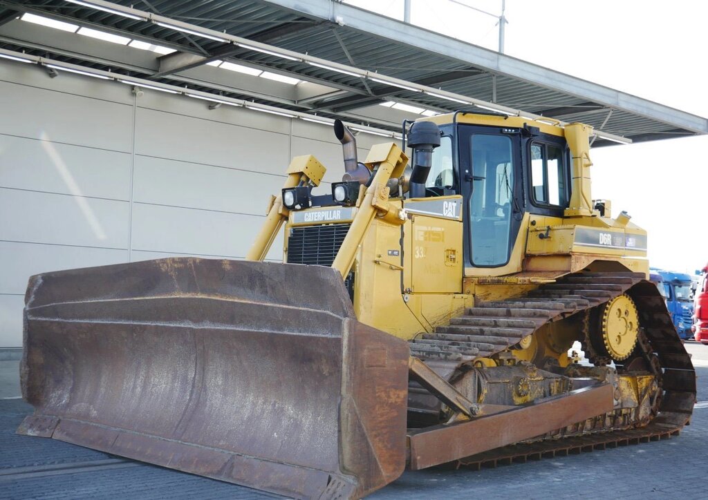 Бульдозер Caterpillar D6R LGP III. - порівняння