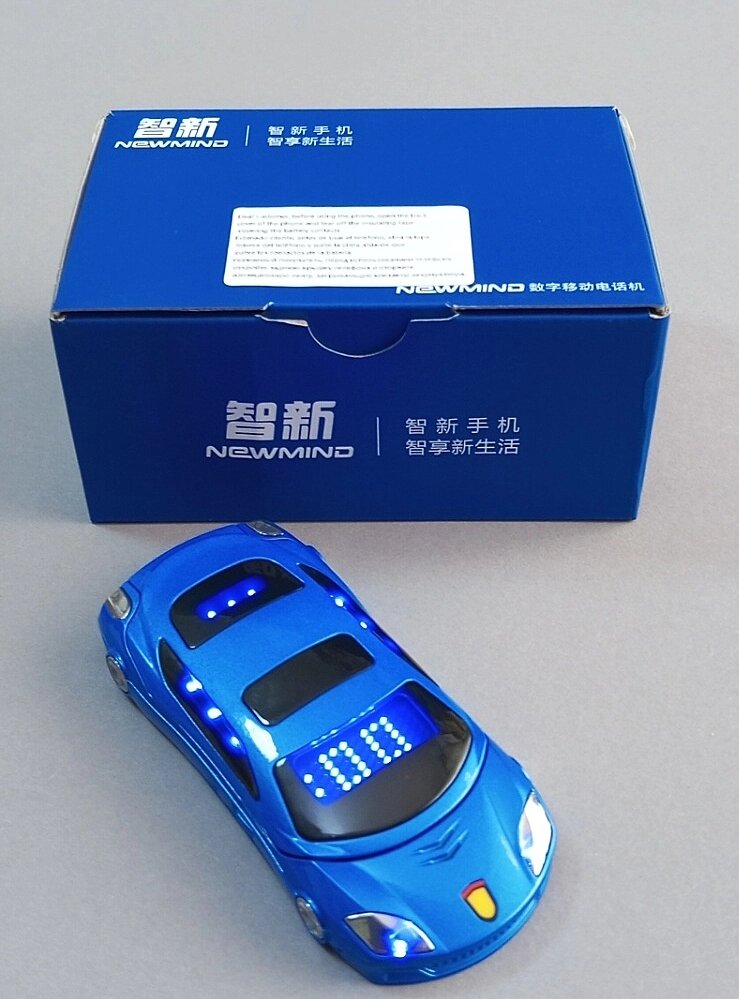 Мобільний телефон-розкладачка PHONEMAX F15, міні-модель спортивного автомобіля, 2 SIM-картки, Bluetooth, синій від компанії ПО СПЕЦАНТЕННИ Зв'язок без перешкод! - фото 1